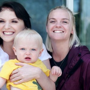 Mandy and Zoe holding baby son