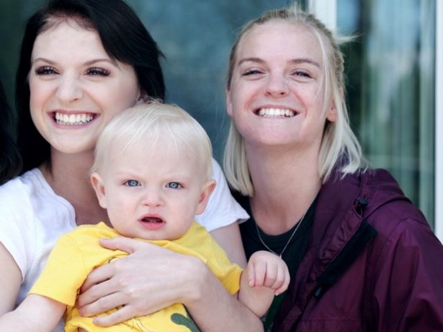 Mandy and Zoe holding baby son