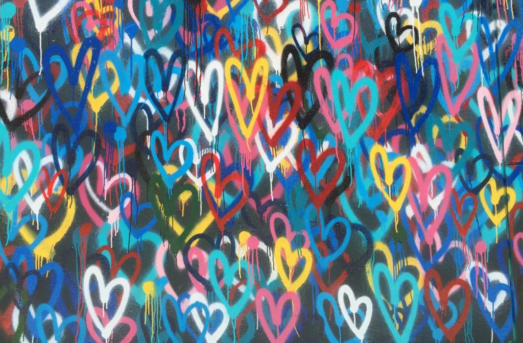 hearts on a wall in spray paint