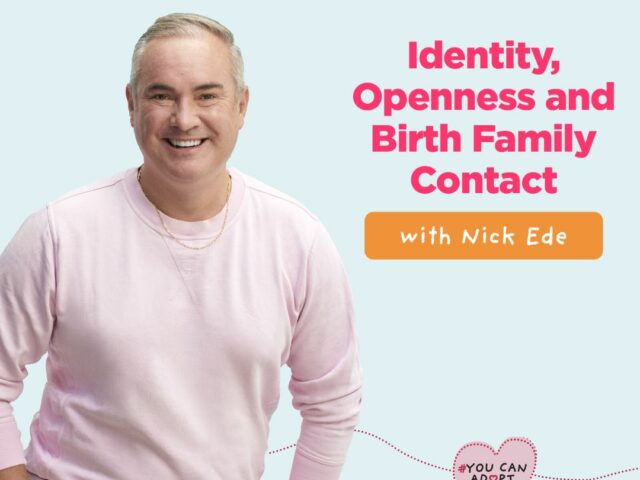 Nick Ede wear a pale ink jumper and stands casually smiling at teh camera. He is a white man in his 50s with short grey hair.