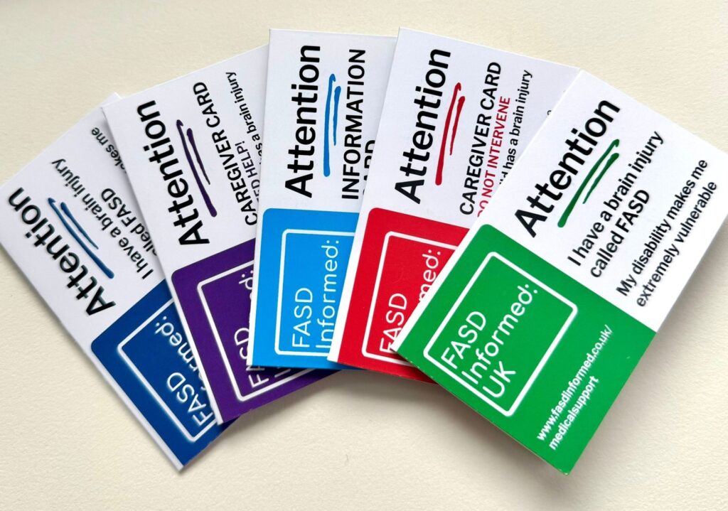 A set of wallet size cards by FASD Informed that explain someone has FASD and may need additional help communicating.