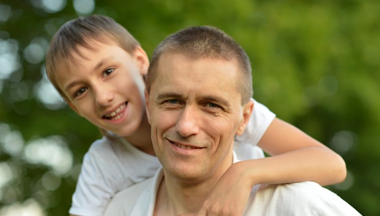 Picture of a forever dad and adopted son.